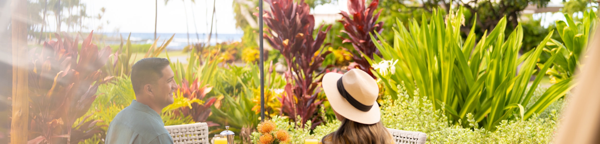 a couple eating on an outdoor patio