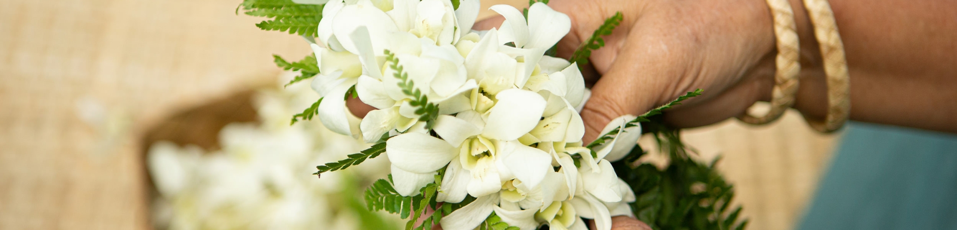 close up of flowers for lei making