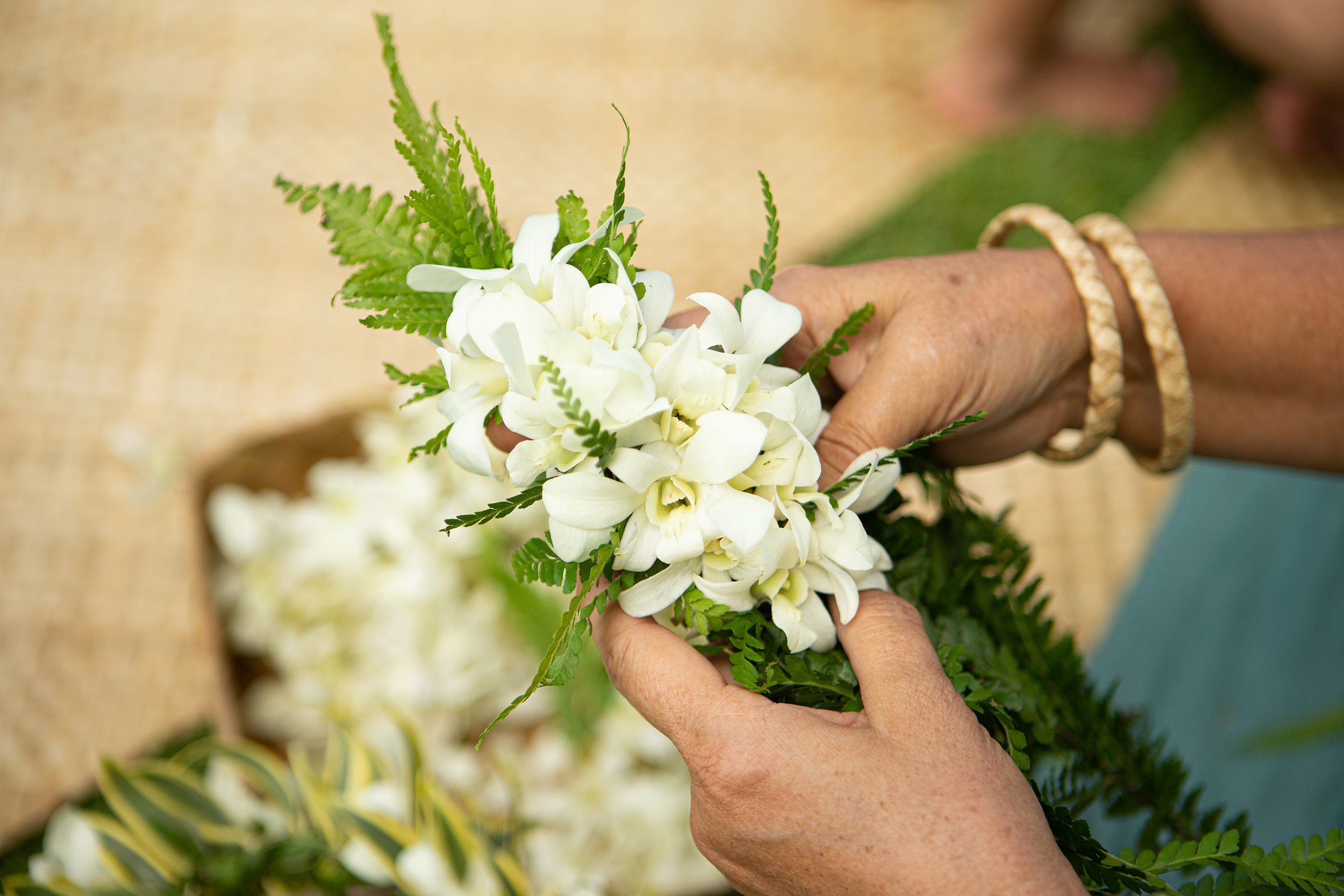 close up of flowers for lei making