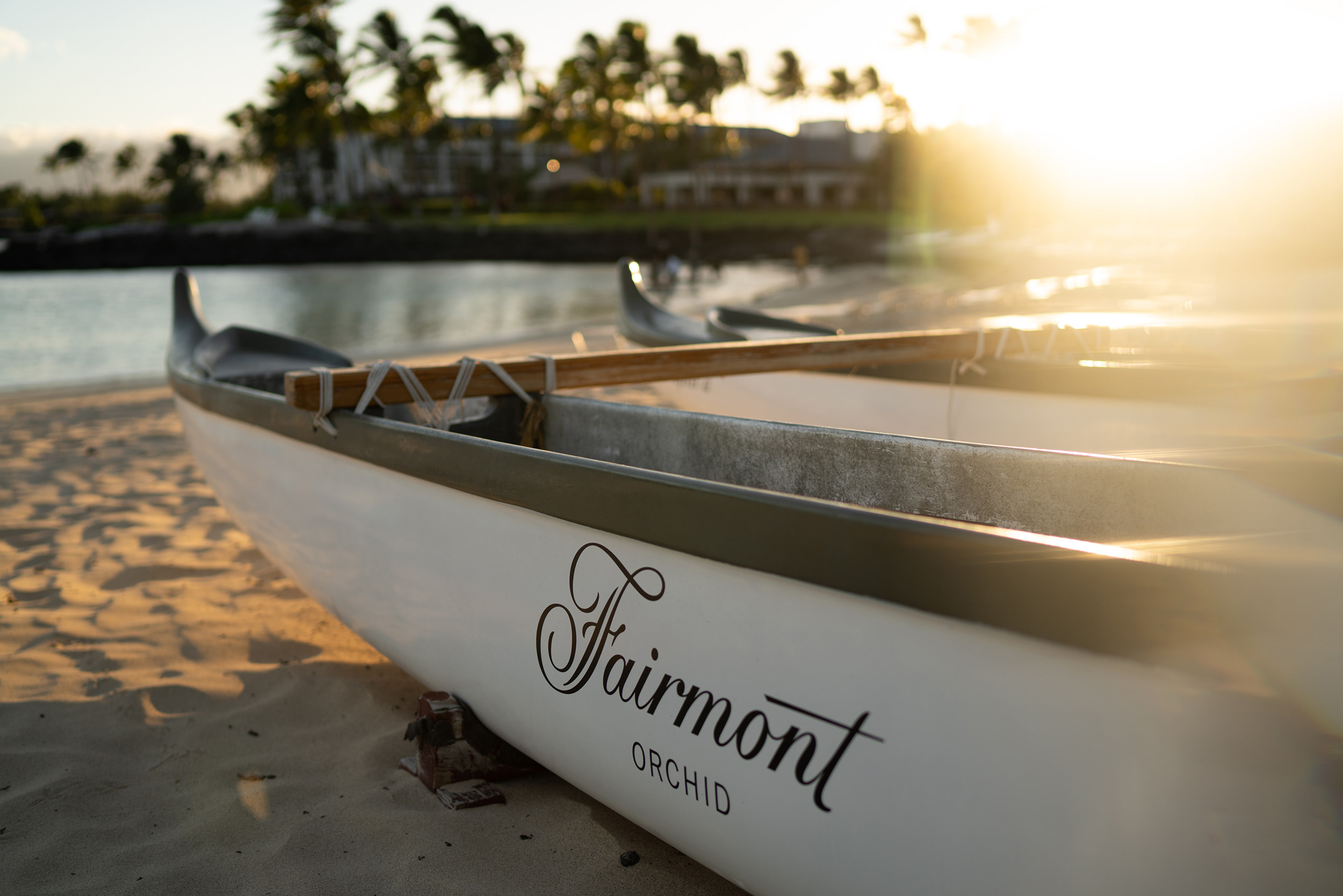 fairmont orchid logo on a canoe