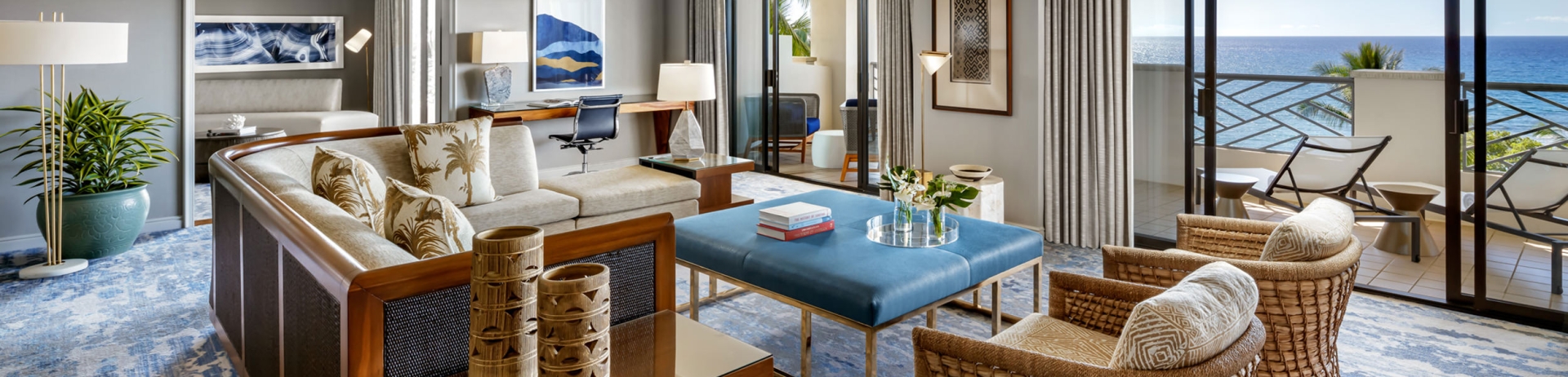 living room area with hints of blue and wicker