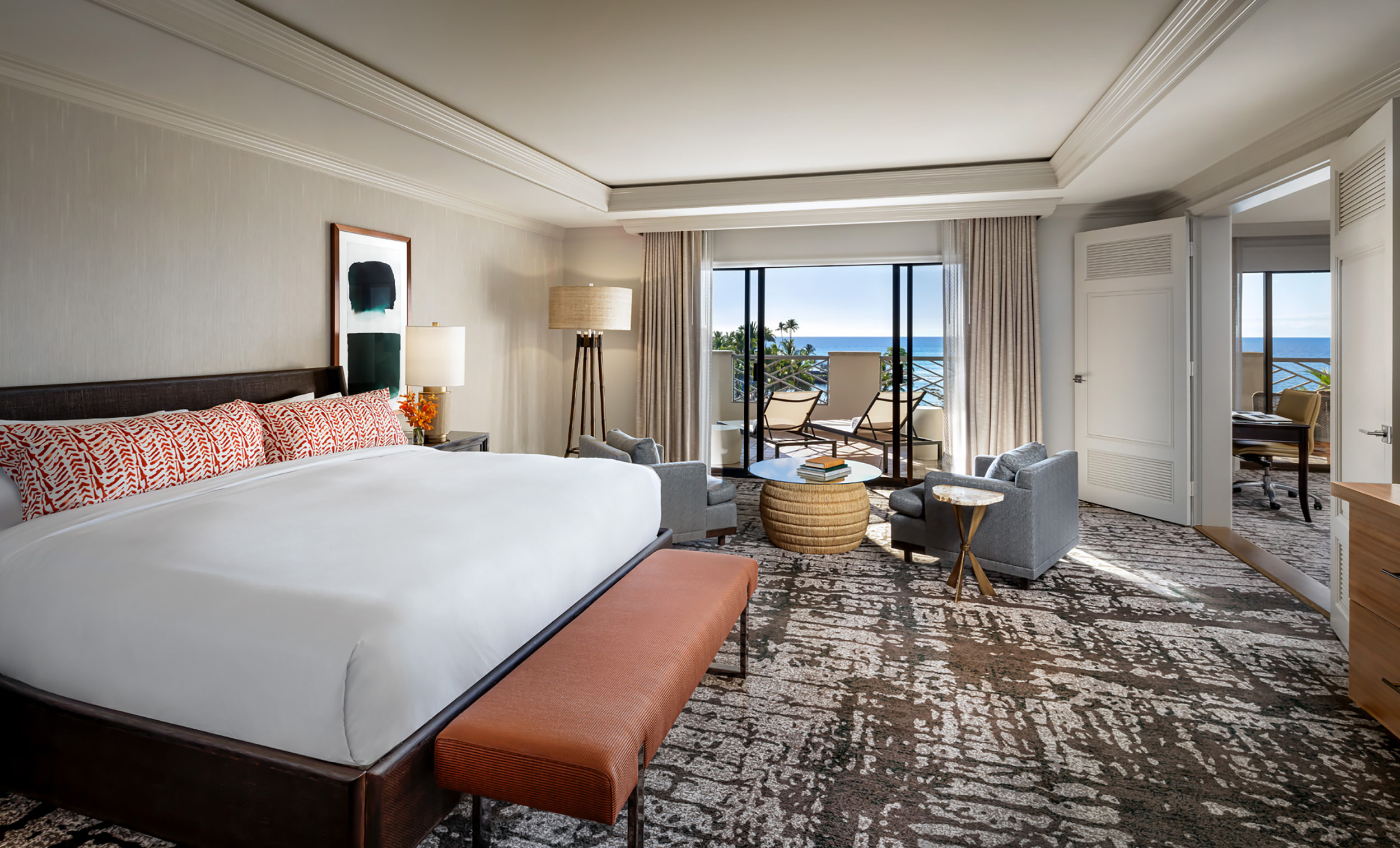 bedroom with large bed and sitting area