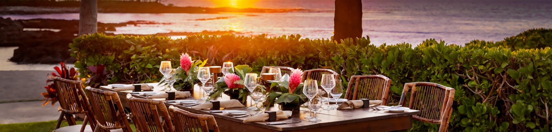 close up of dining table with view of beach
