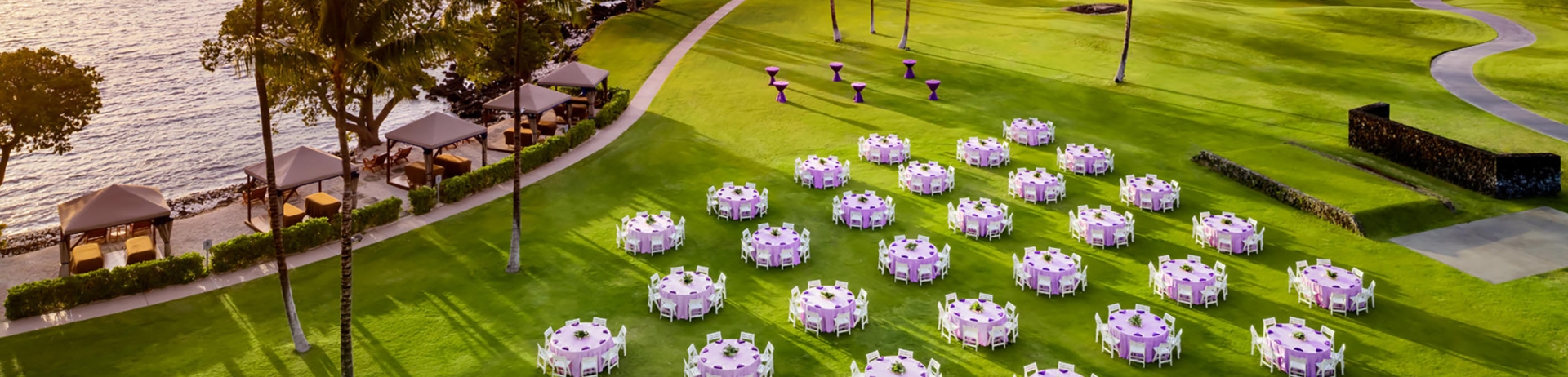 aerial of round tables set up on lawn