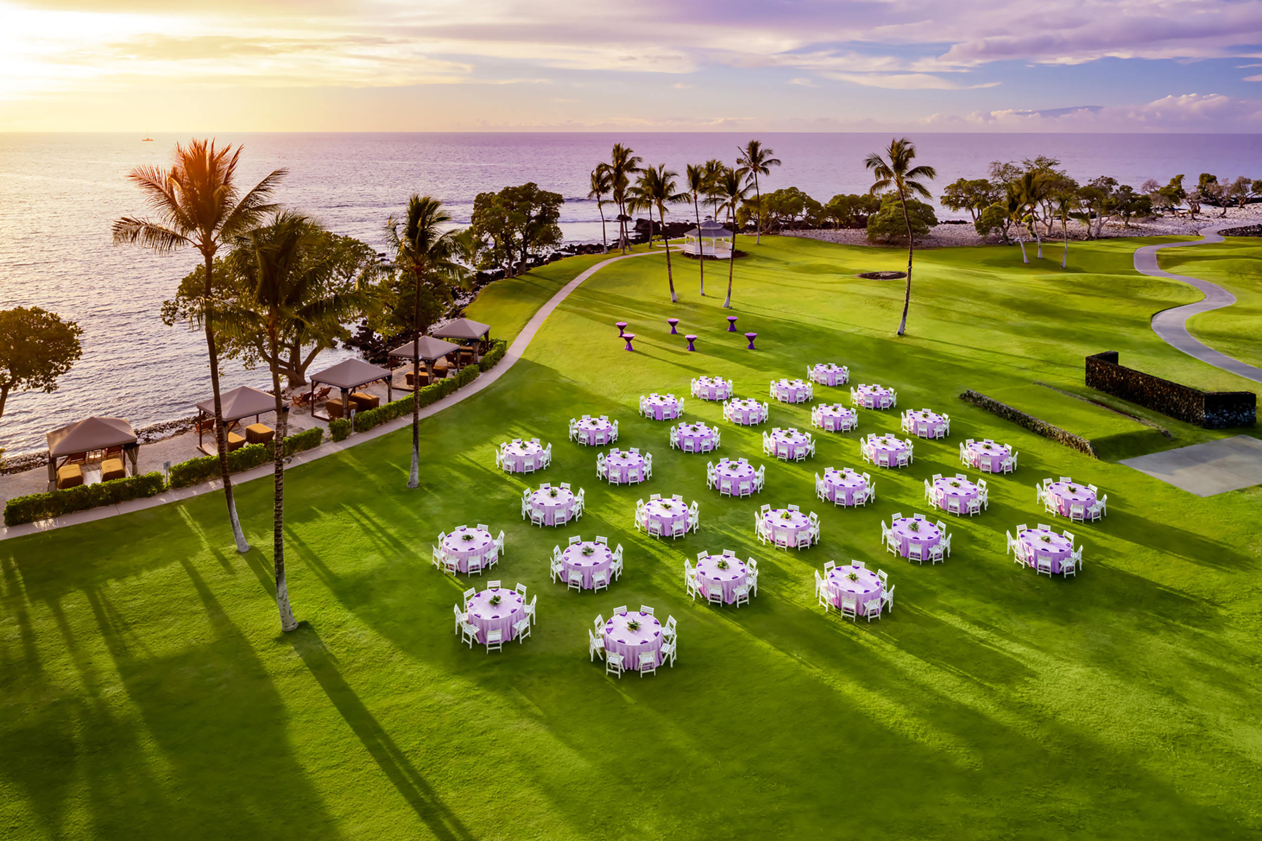 aerial of round tables set up on lawn