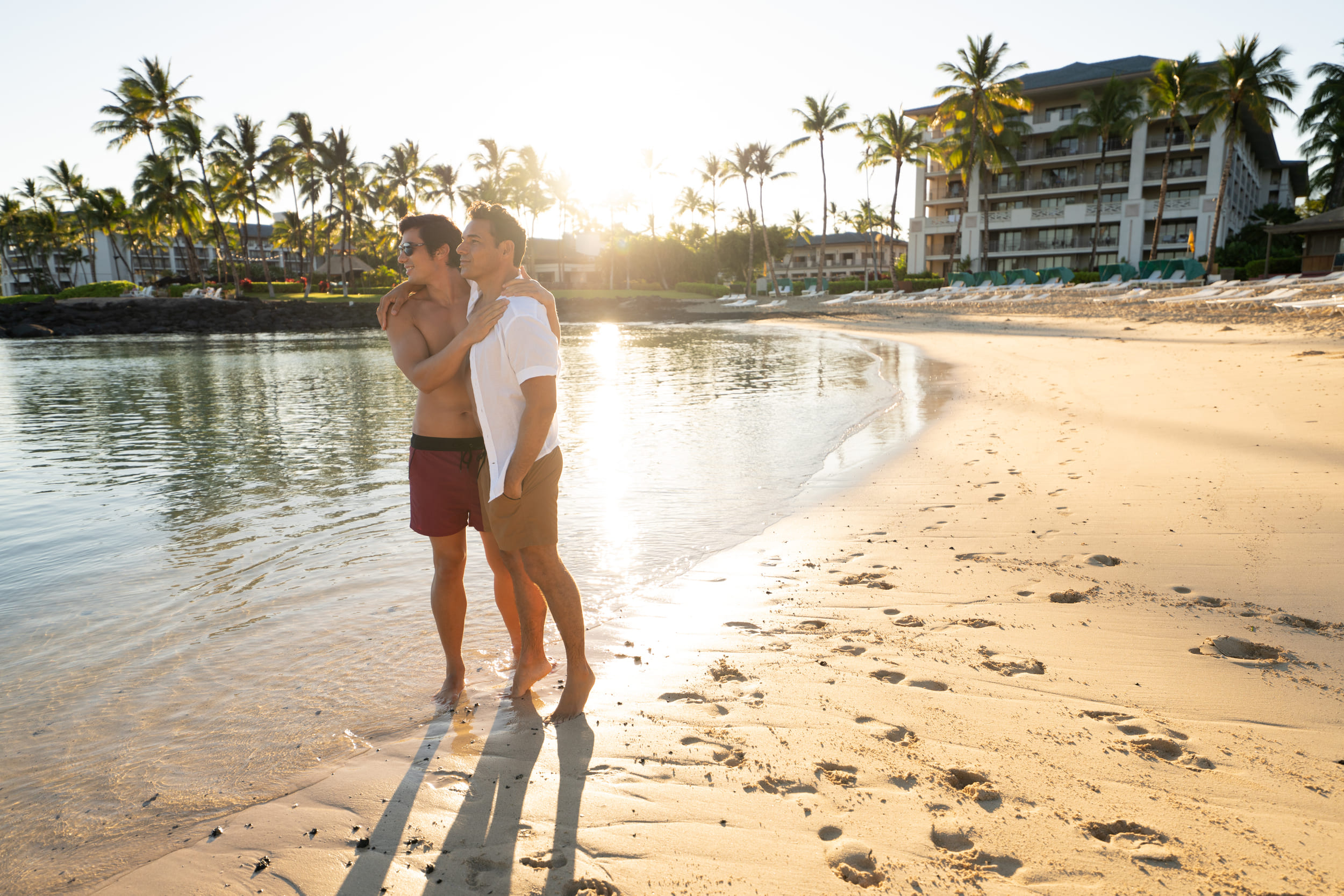 couple standing on the beach