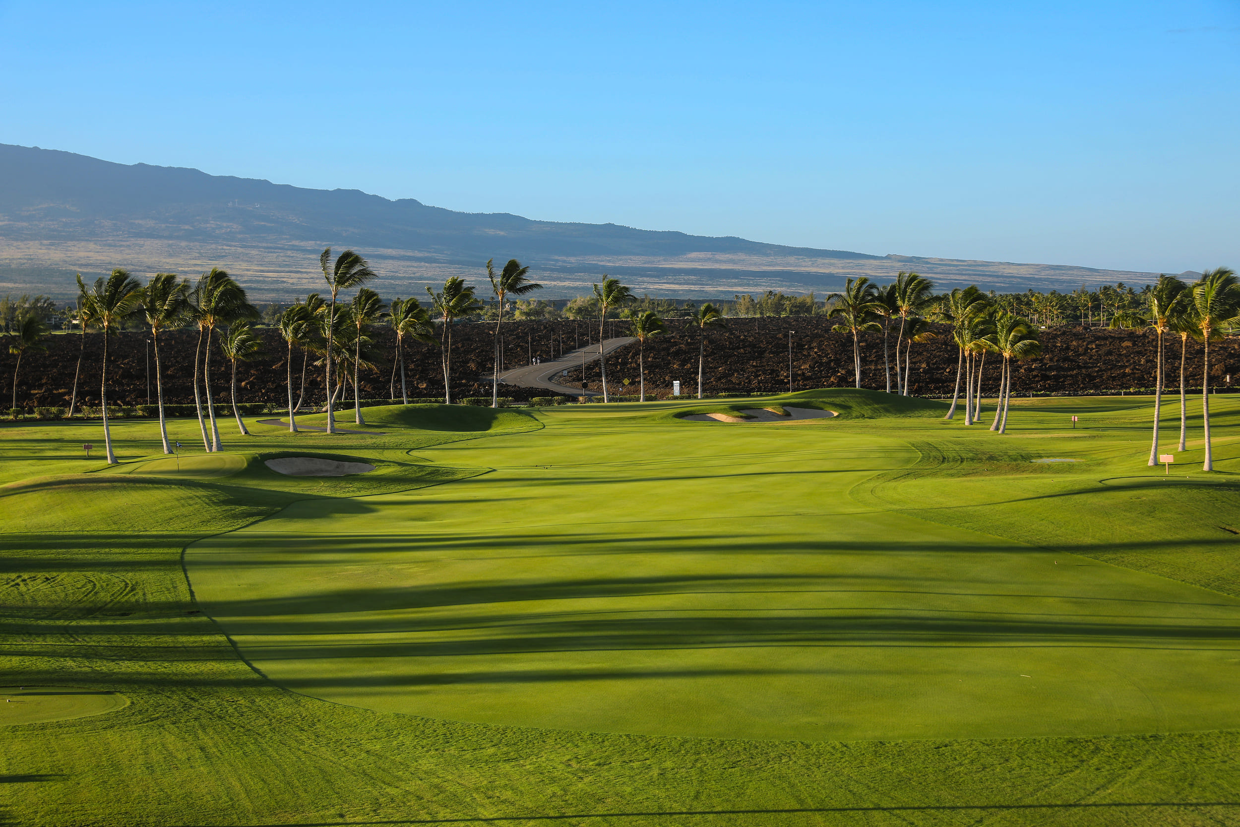 golf course with view of the mountains
