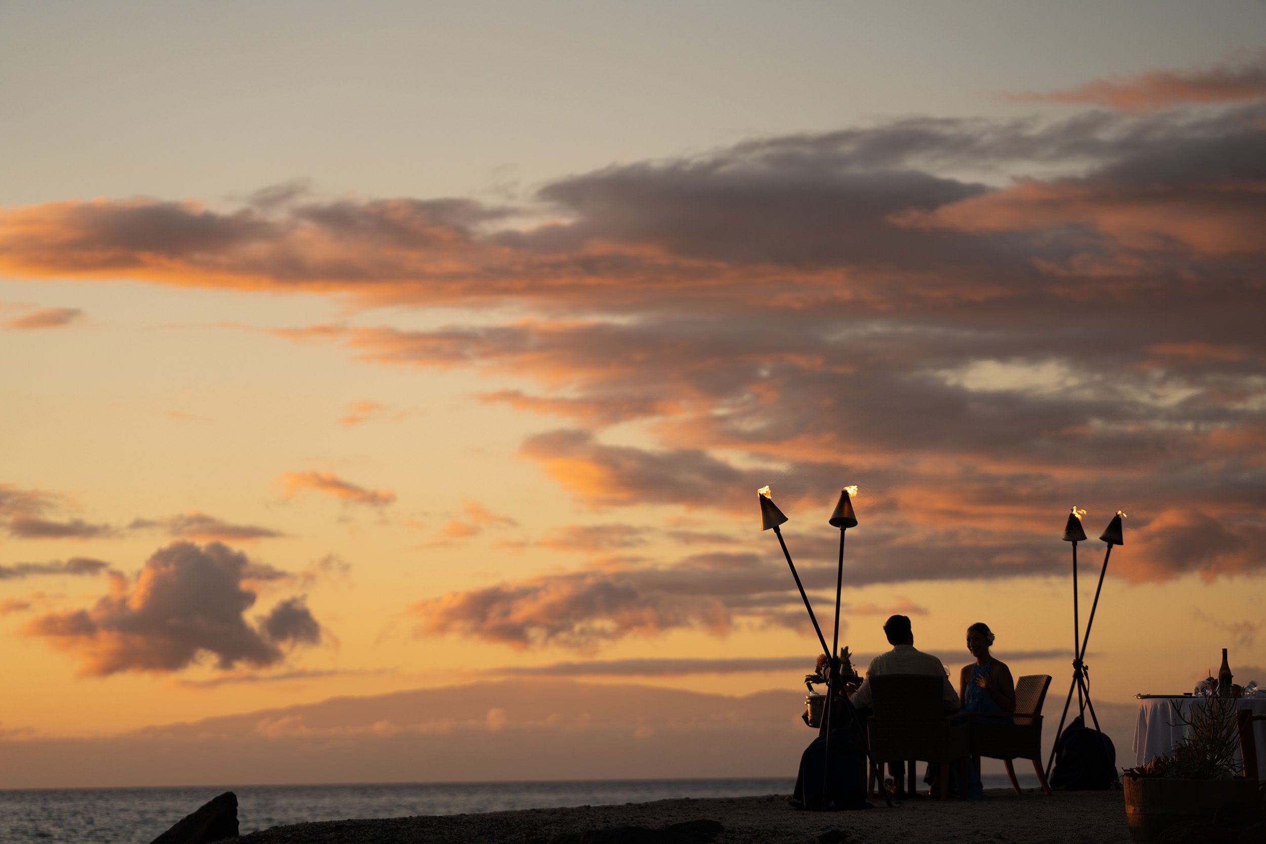couple sitting on a beach
