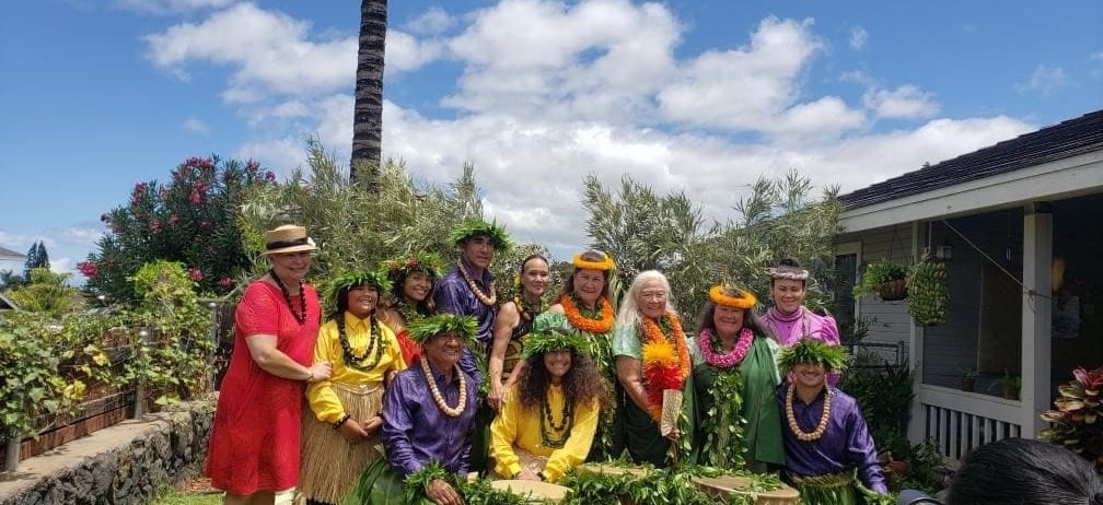 group of people in front of their drums