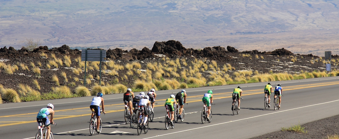 IRONMAN cyclists bike along Kohala Coast